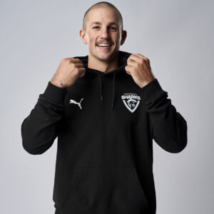 Southport Sharks player, Zach Molloy, wearing Sharks x Puma Hoodie with Sharks logo on left chest and Puma logo on right.